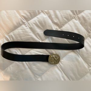 Cabi black leather belt with removeable brass buckle. Size Medium. Never worn.